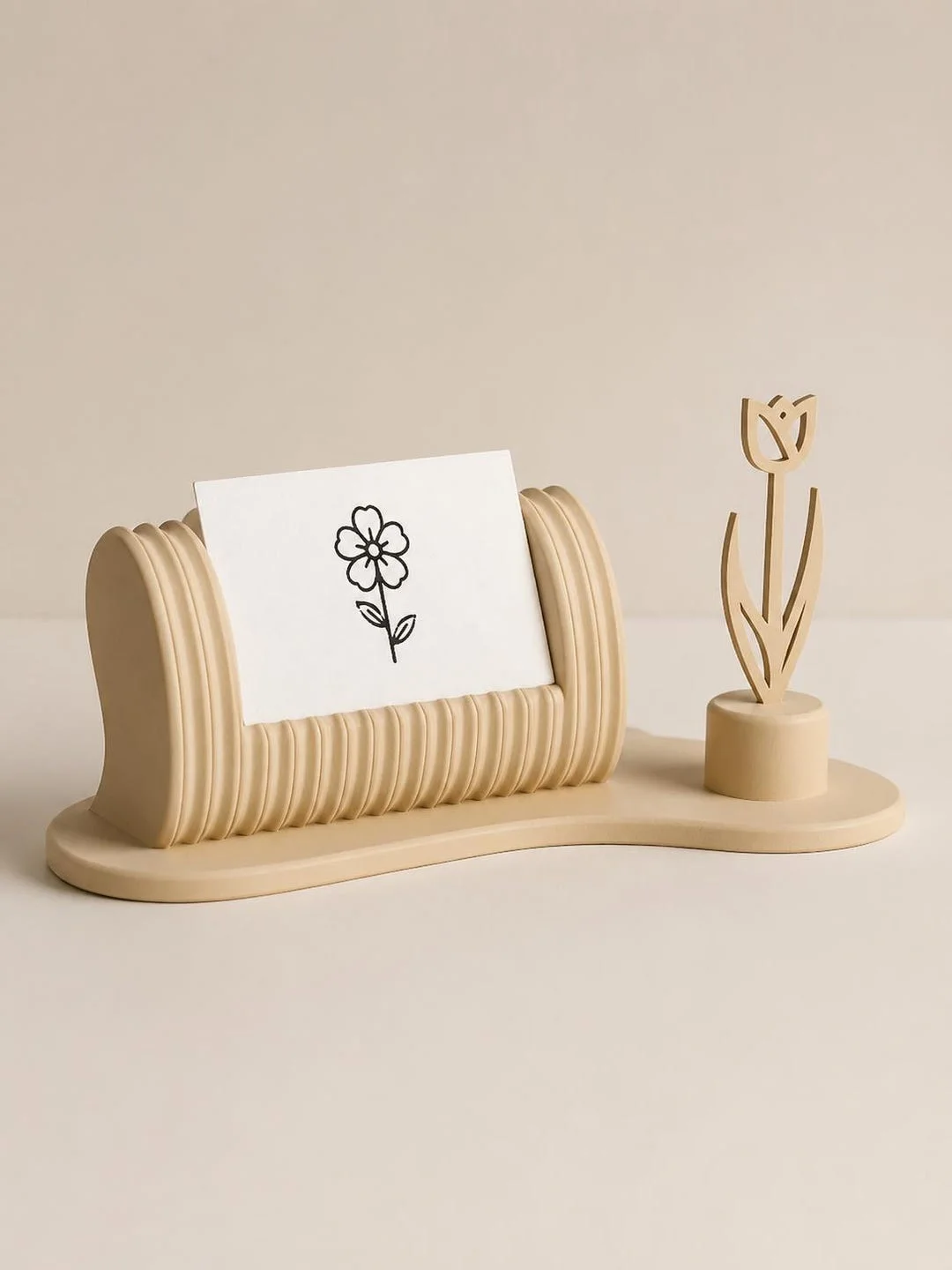 Floral business card holder in beige with a business card displayed
